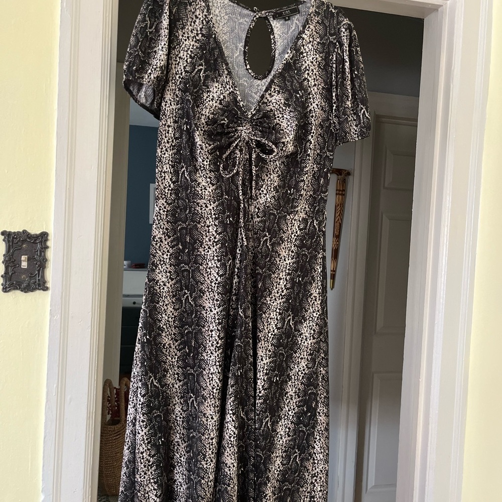 Elegant snake design dress/pants at bottom